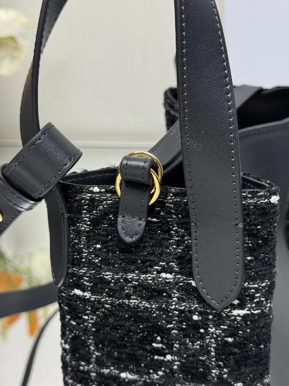 View 2 of Compact Black Leather Tote with Textured Panel, Adjustable Strap