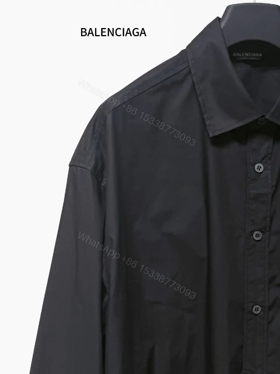 View 4 of Structured Minimalist Button-Front Shirt with Subtle Crest, Black