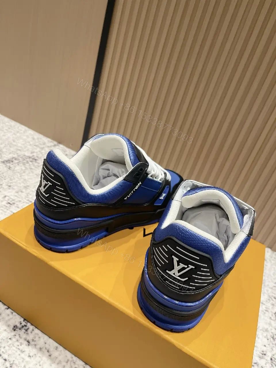 View 9 of Textured Blue-Black Leather High-Tops with Bold Detailing