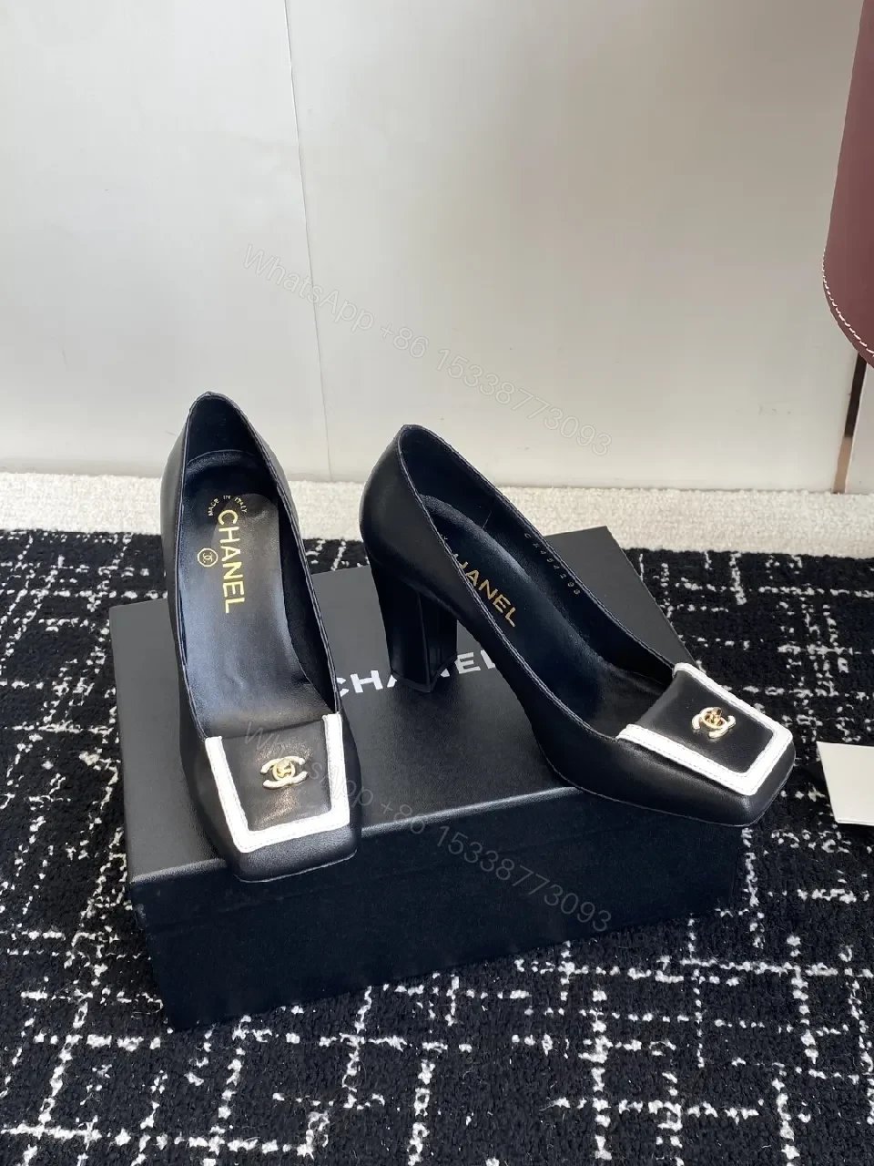 Chic Black Leather Heels with White Trim Detail Pumps — view 1