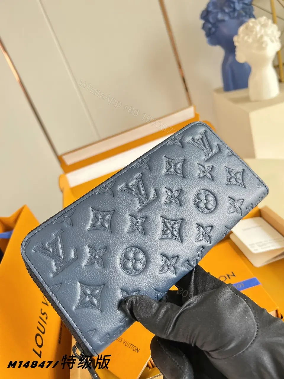 View 2 of Blue Embossed Leather Minimalist Zip Wallet with LV Pattern