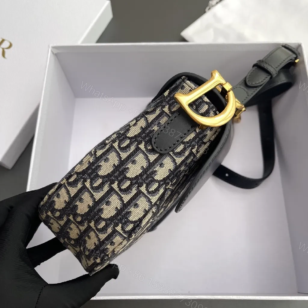View 4 of Chic Saddle Bag: Monogram Jacquard, Leather Trim, Gold Hardware, Everyday Versatility