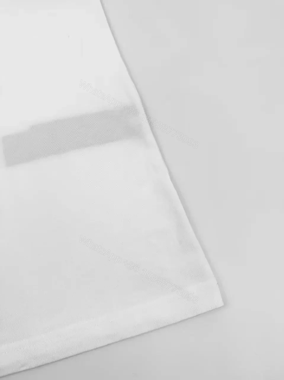 View 11 of White Cotton Minimalist Logo Tee with Signature Graphic