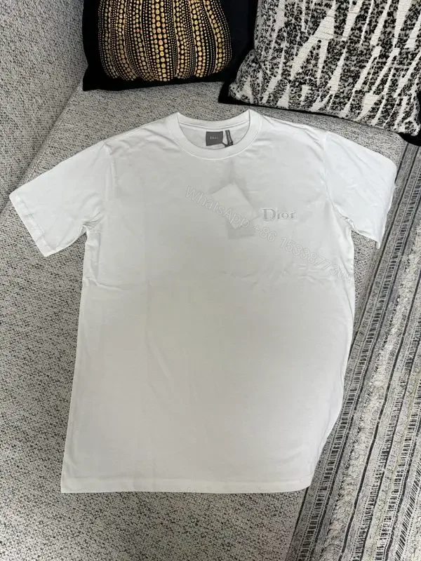 Minimalist White Cotton Tee with Subtle Logo — view 1
