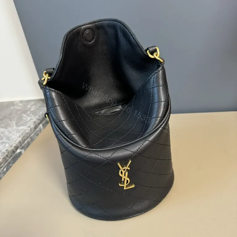 View 9 of Structured Black Quilted Bucket Bag with Gold Accents