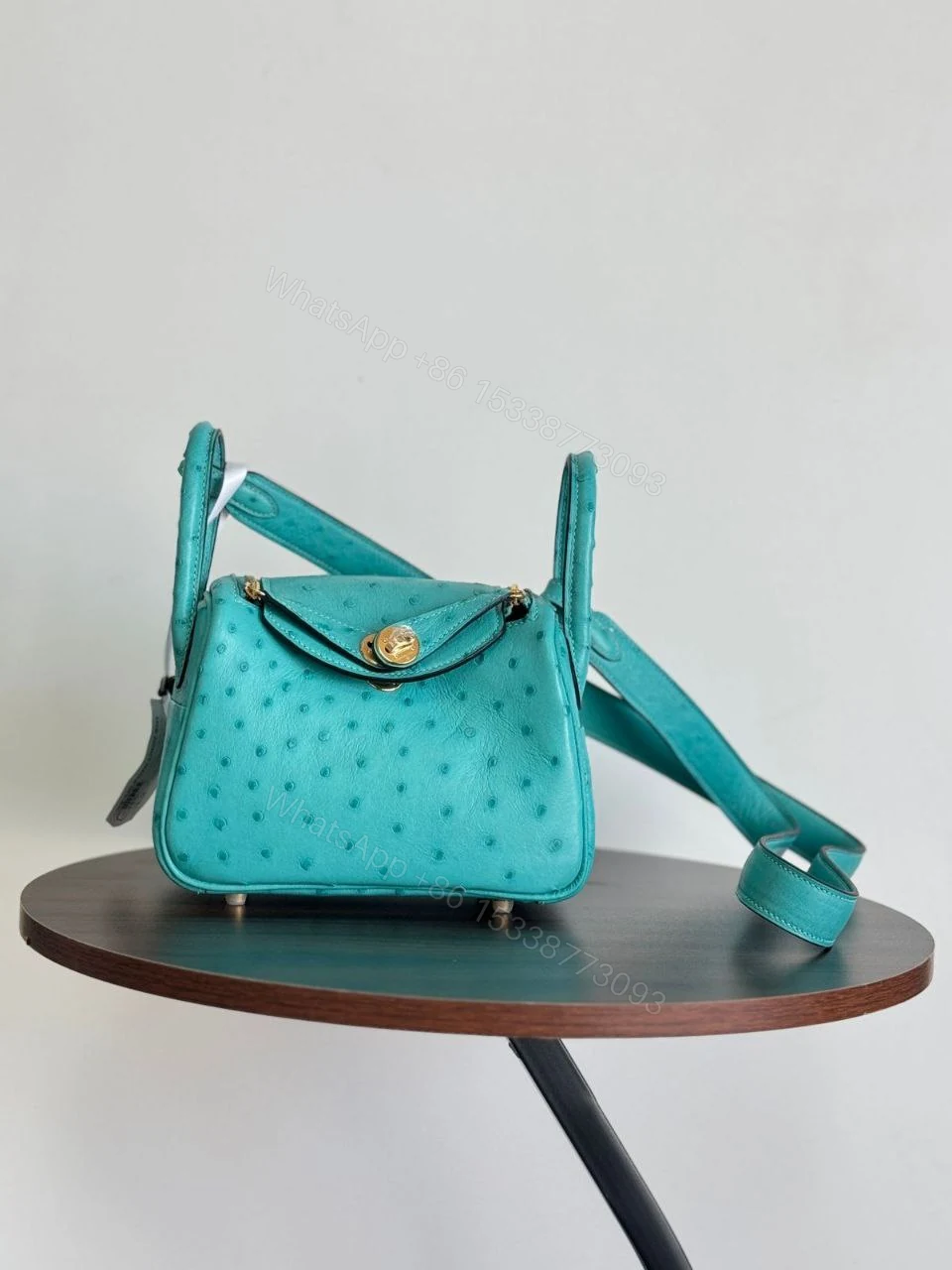 View 7 of HERMÈS Ostrich Mini Lindy shoulder bag in Terre Cuite