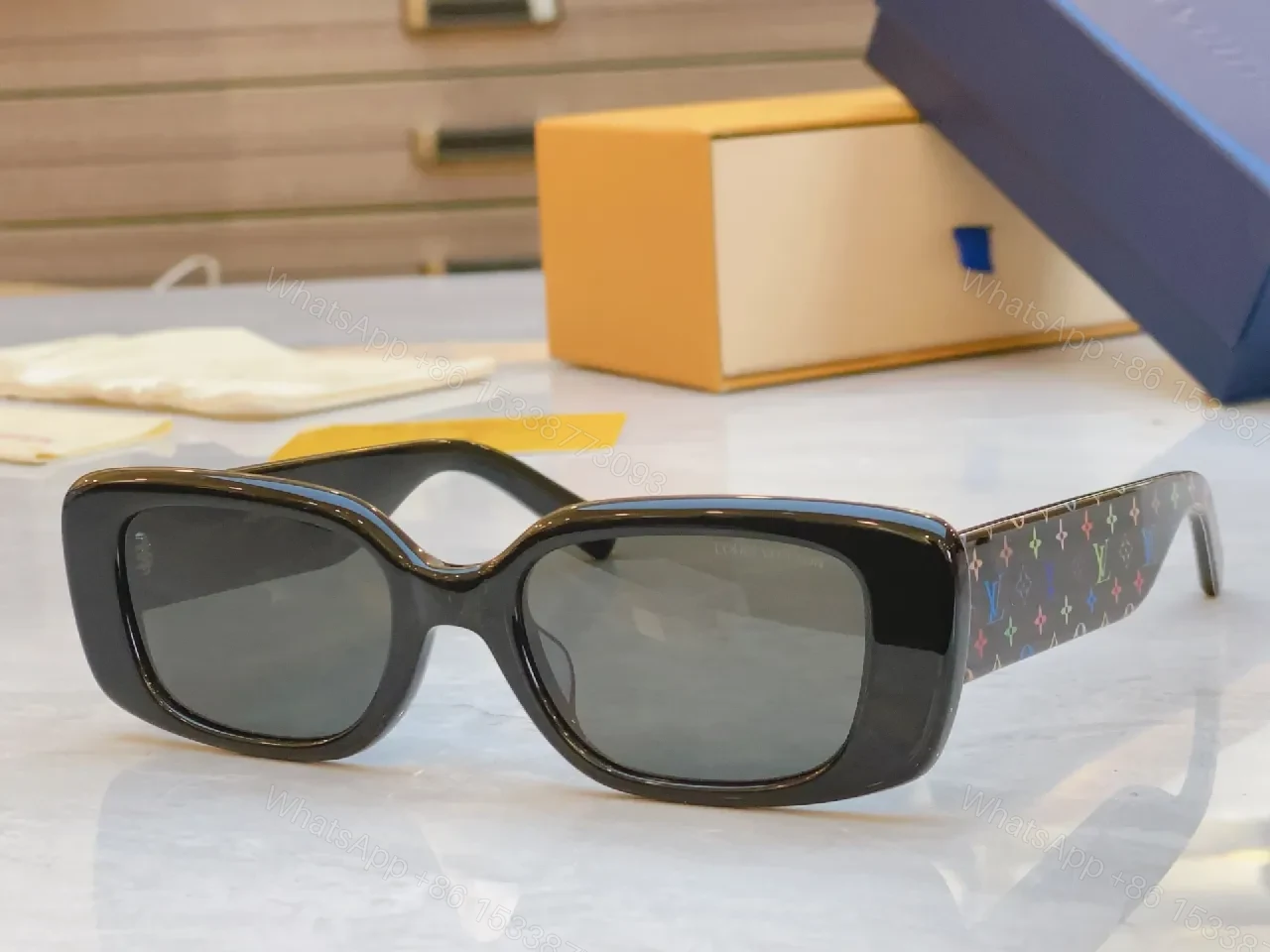 View 3 of Pink Frame Sunglasses with Multicolor Strap — Bold Luxury Sunnies