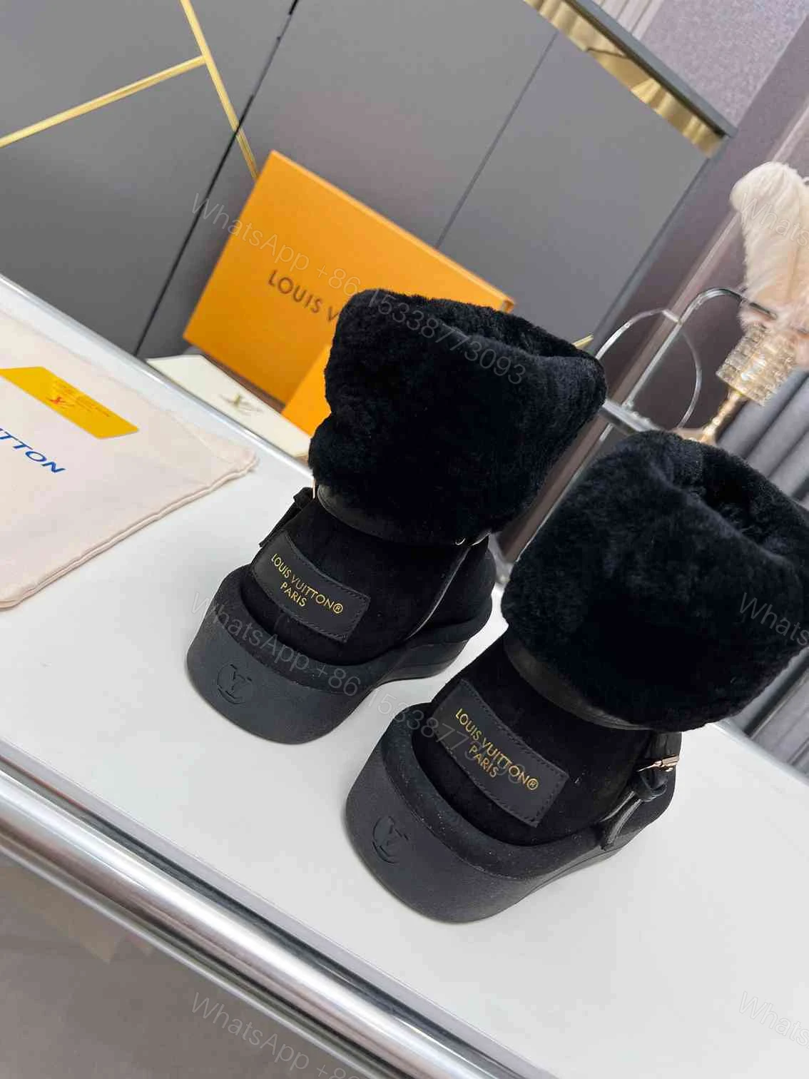 View 2 of LOUIS VUITTON ASPEN PLATFORM ANKLE BOOT BLACK 1AC78O