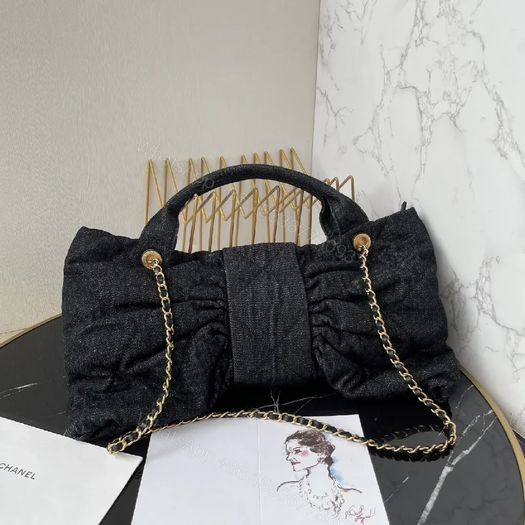 View 4 of Chic Denim Quilt Bag with Gold Hardware