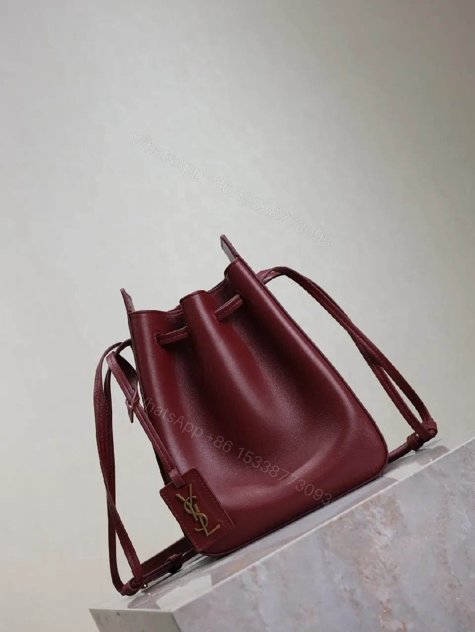 View 6 of Deep Bordeaux Leather Drawstring Bucket Bag—Elevated Everyday Style