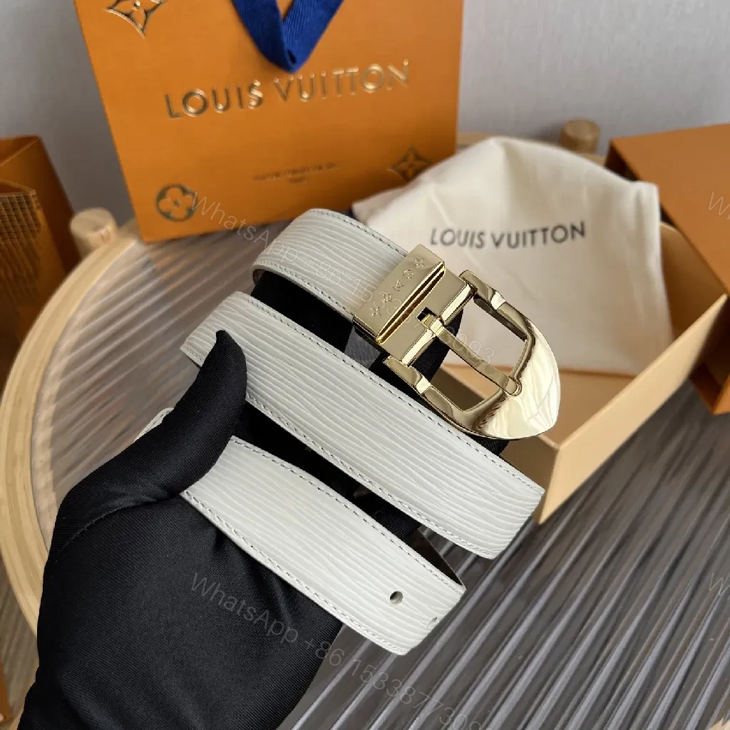 View 2 of White Leather Belt: Subtle Gold Buckle, Monogram Detail, Modern Luxury
