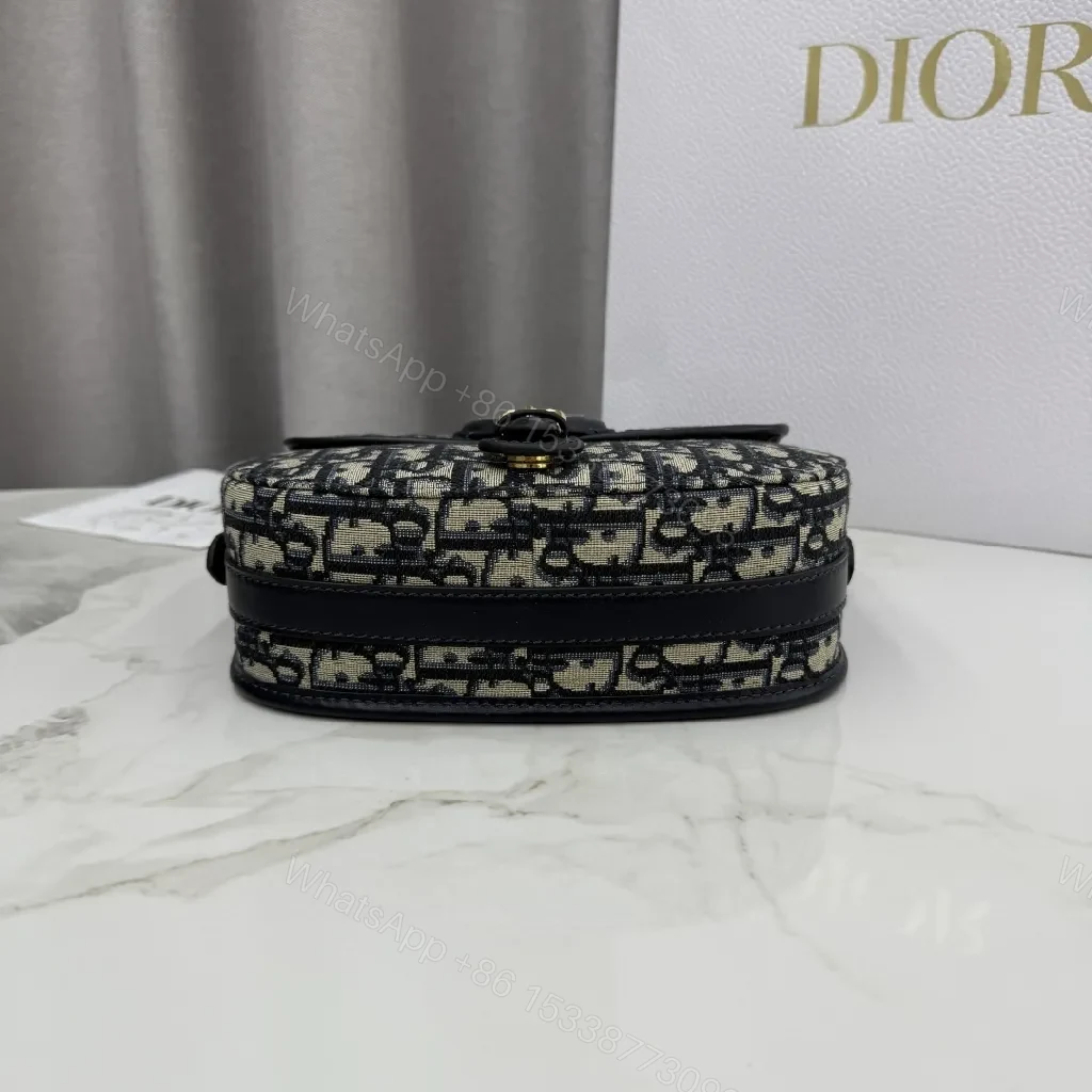 View 9 of Monochrome Canvas Crossbody: Luxe Pattern, Gold Hardware