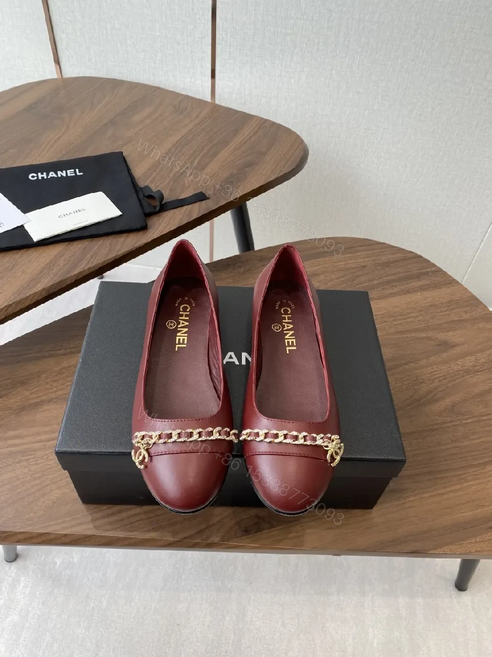 View 6 of Burgundy Leather Flats with Gold Chain Detail - Everyday Luxury