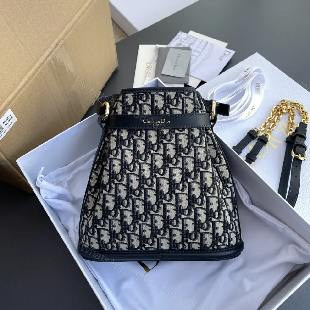 View 8 of Structured Classic Monogram Canvas Bucket Bag with Gold Hardware