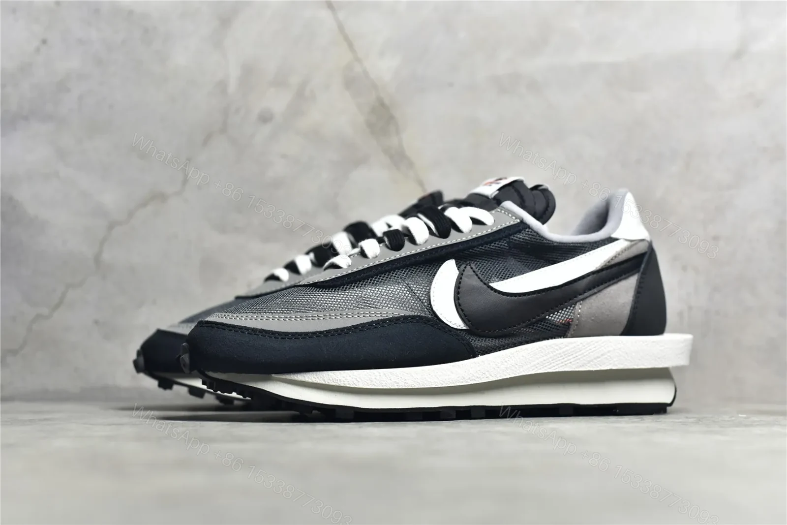 View 2 of Sacai × Nike Waffle Black and White Reps