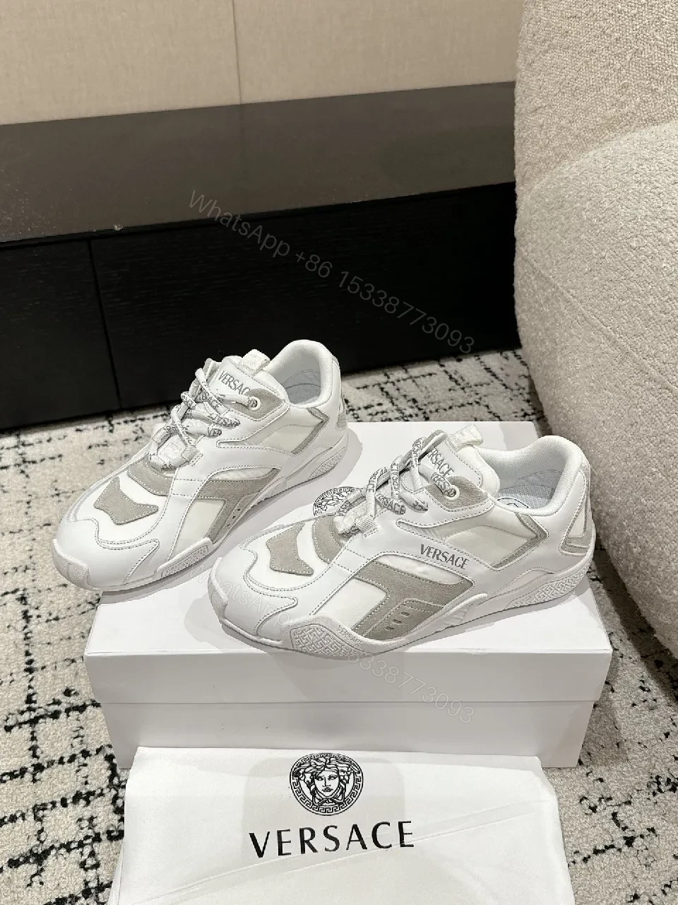 Chunky White Trainer with Subtle Graphite Accents: Everyday Luxury Sneaker — view 1