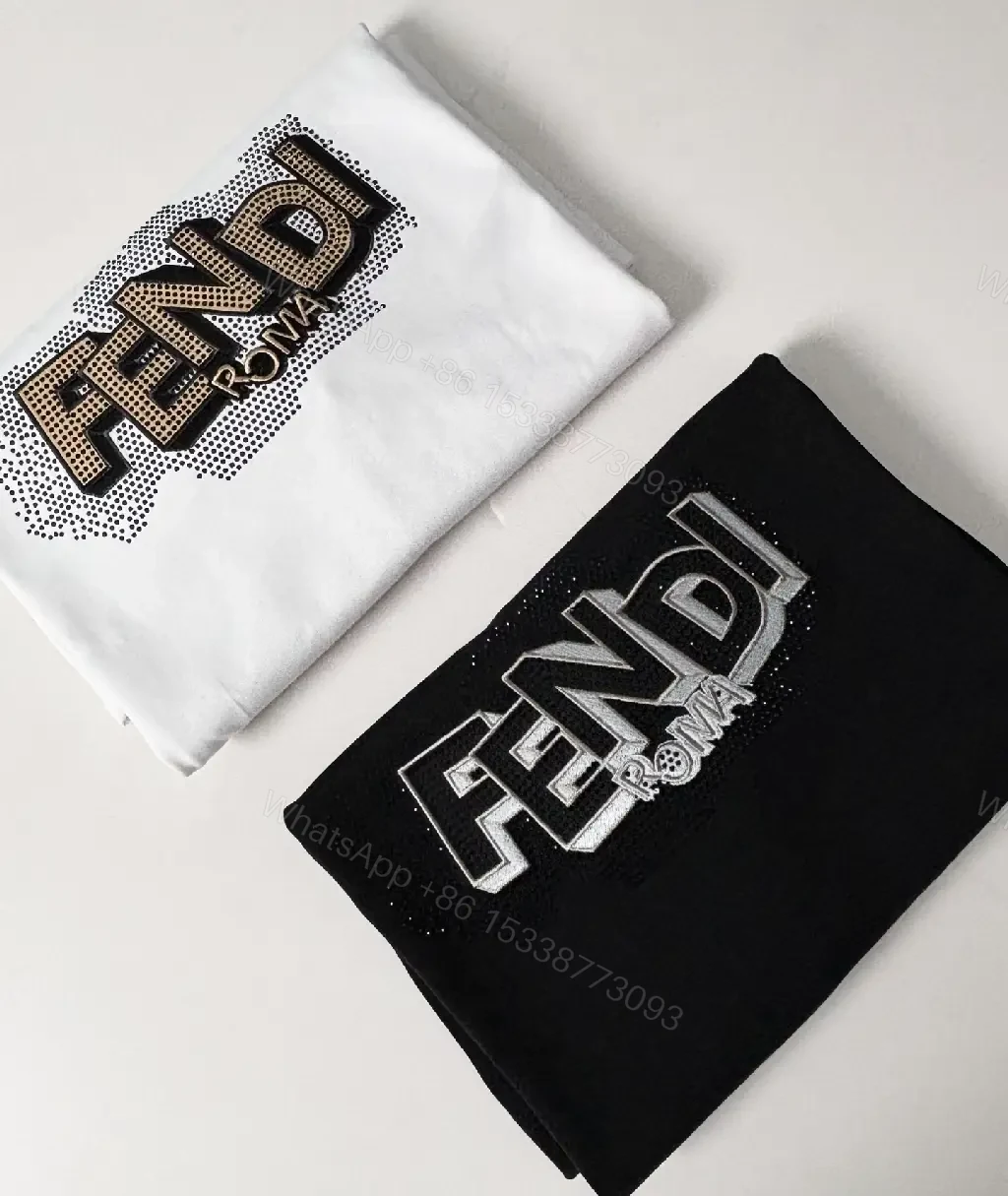 View 2 of Black Knit Tee with Bold Contrast Logo, Minimalist, Everyday Comfort