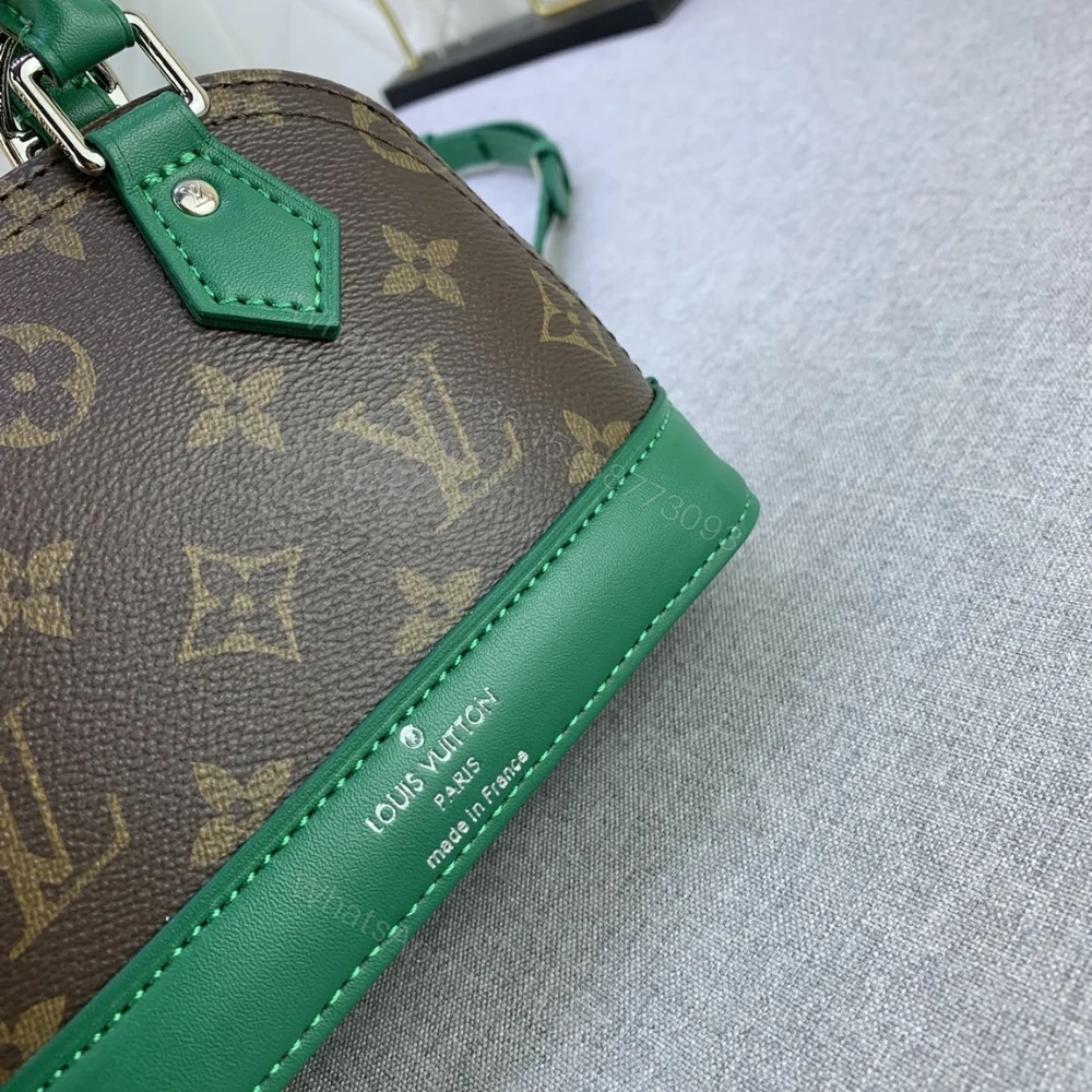 View 7 of Louis Vuitton Mini Alma Monogram Canvas Mix With Green 18Cm M83204
