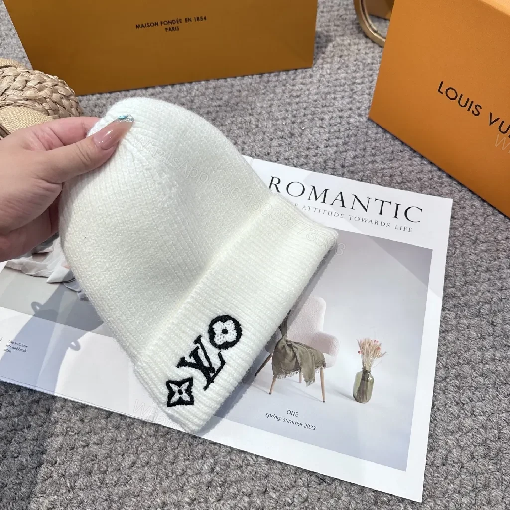 View 7 of White Knit Beanie – Luxe Logo Detail, All-Season Comfort