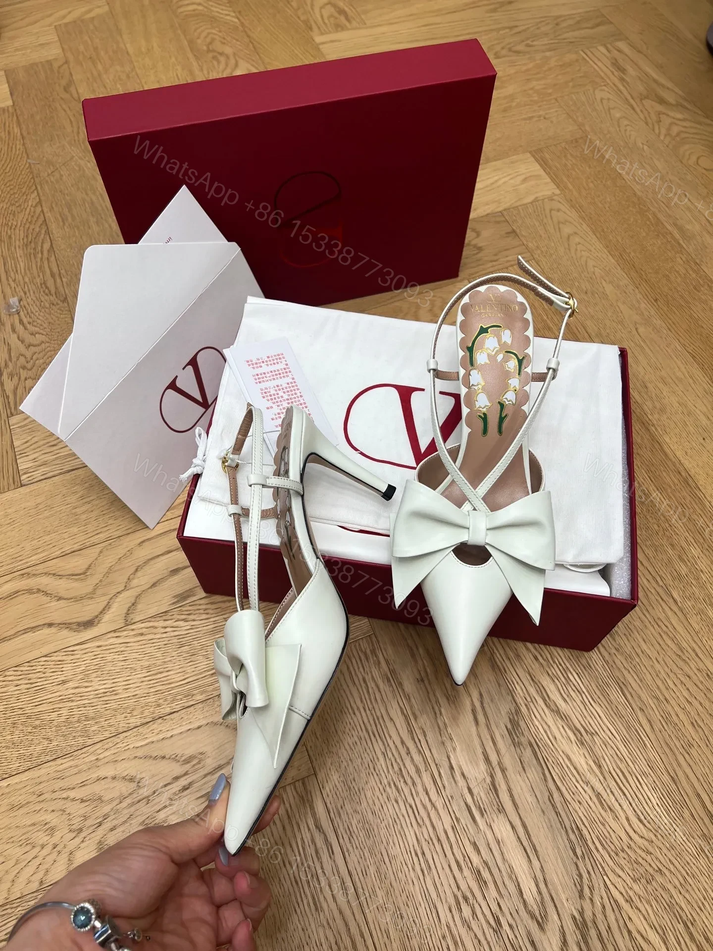 View 2 of Valentino Women White Leather Bow Accent Pumps