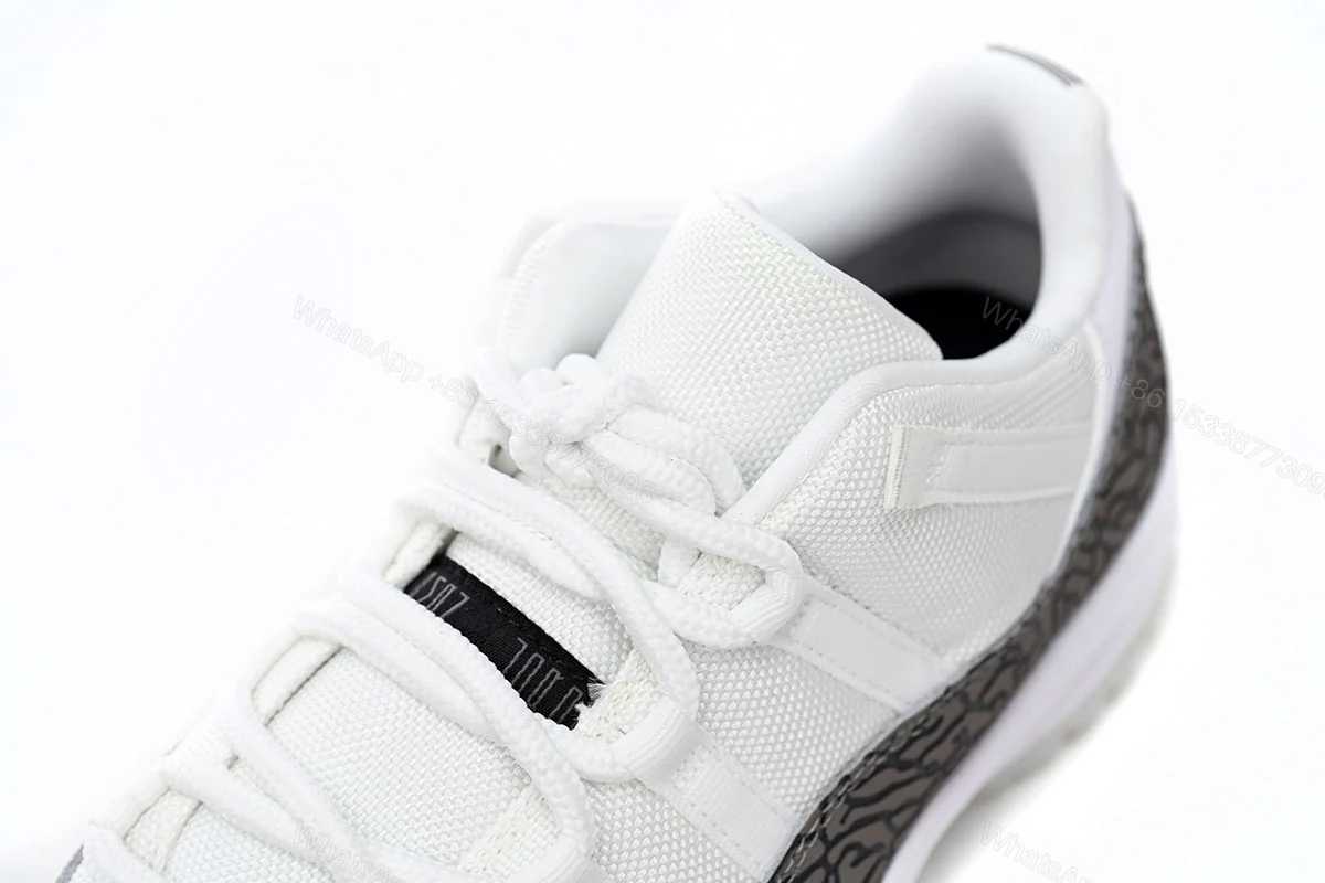 View 7 of Air Jordan 11 Retro Low “Cement Grey” AV2187-140