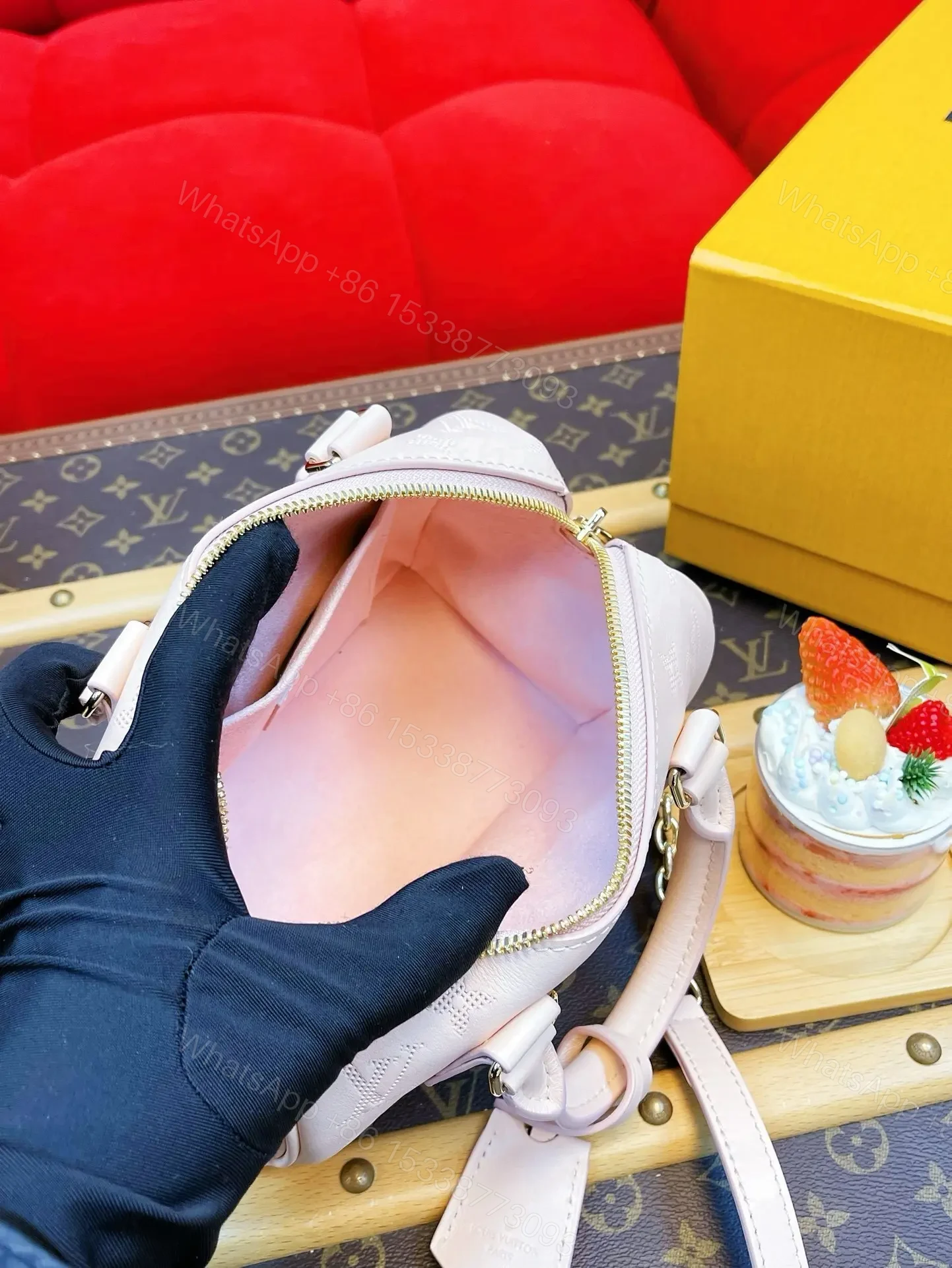 View 4 of Louis Vuitton Speedy 20 in pink Monogram Empreinte