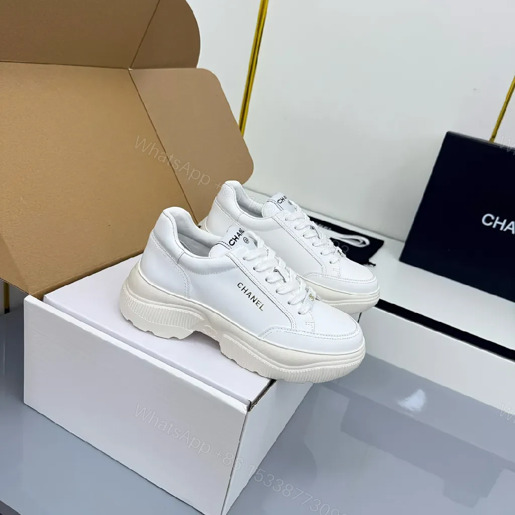 White Leather Platform Sneaker with Subtle Chanel-Inspired Detail — view 1
