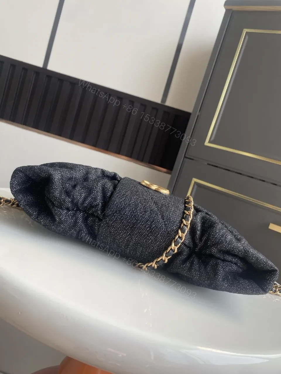 View 5 of Chic Black Denim Mini Bag with Gold Emblem