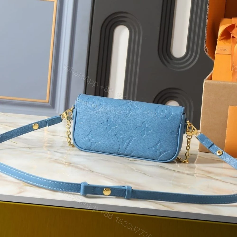 View 4 of Louis Vuitton Wallet On Chain Ivy Monogram Empreinte Blue Jean 23Cm M27755