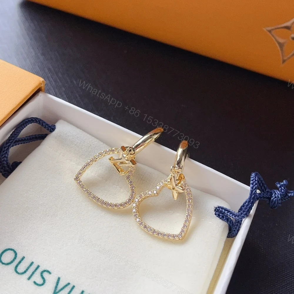 View 5 of LOUIS VUITTON HEART EARRINGS WHITE M02308