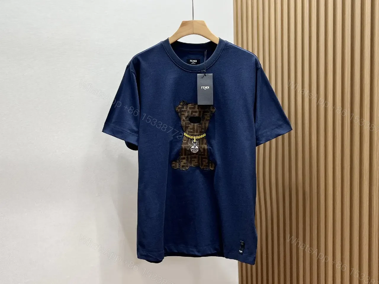 View 9 of Minimalist White Tee: Textured Bear Graphic, Designer-Influenced Luxury Tee