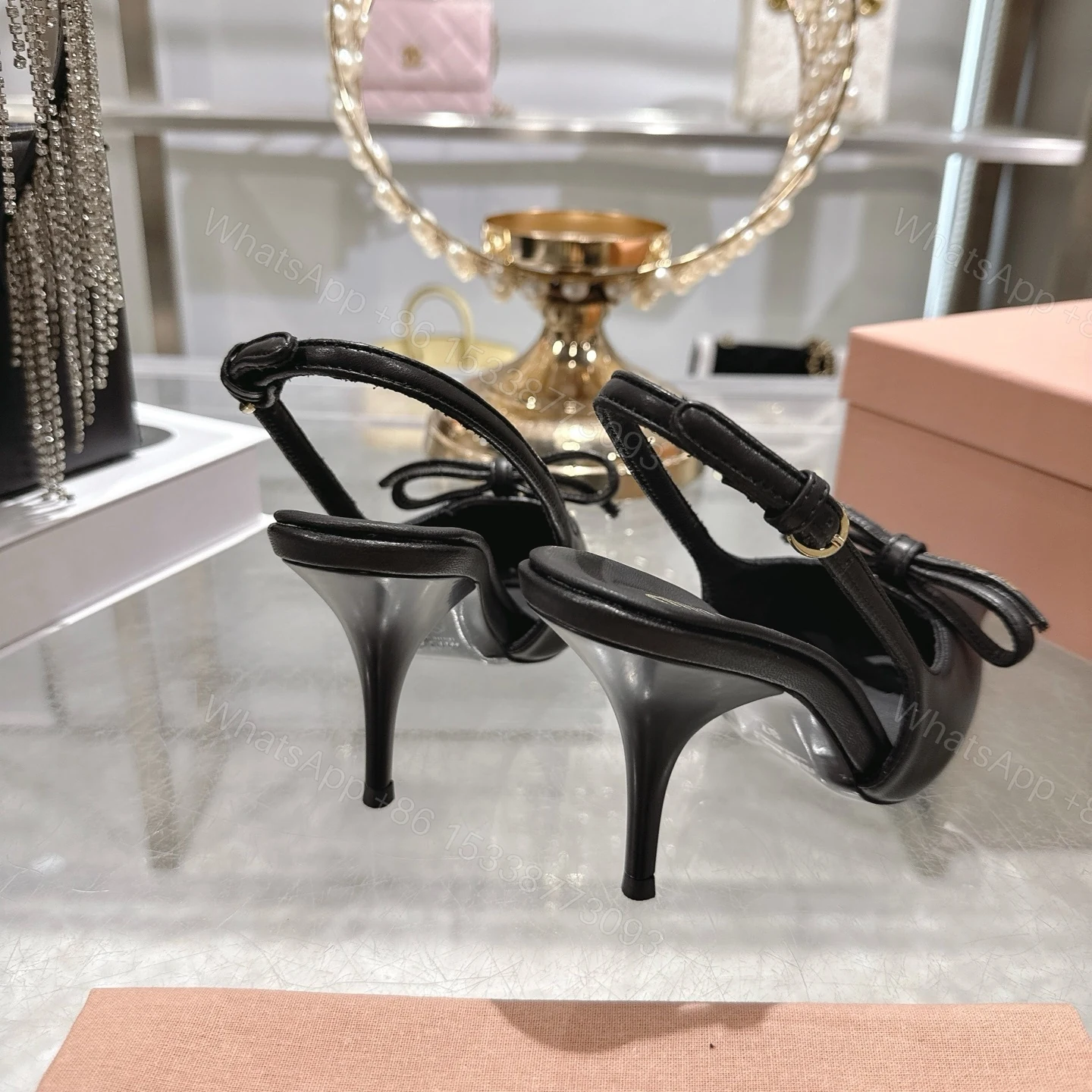 View 5 of Miu Miu Slingback Pumps With Bow Black