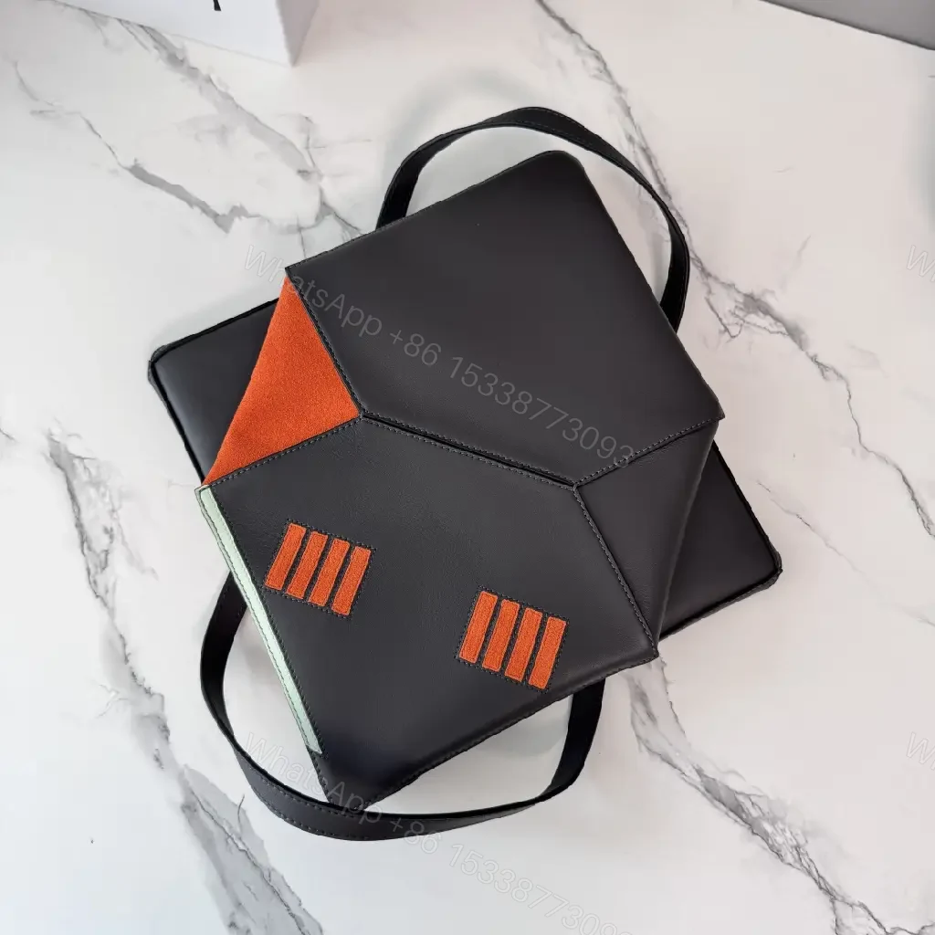 View 2 of Bold Geometry Fox Tote: Color-Block Faux Leather Carryall
