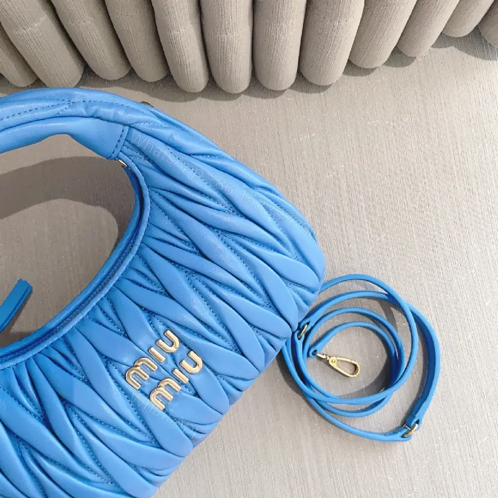 View 3 of Bright Royal Blue Quilted Crescent Handbag with Gold Miu Miu Logo