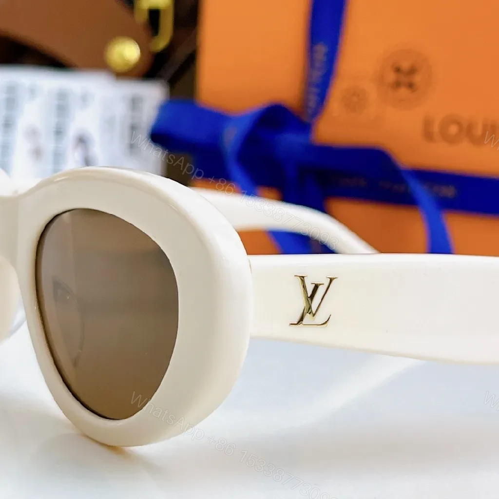 View 4 of Bold Curve Cat-Eye Sunglasses: Luxe, UV-Protected, Gold Accents