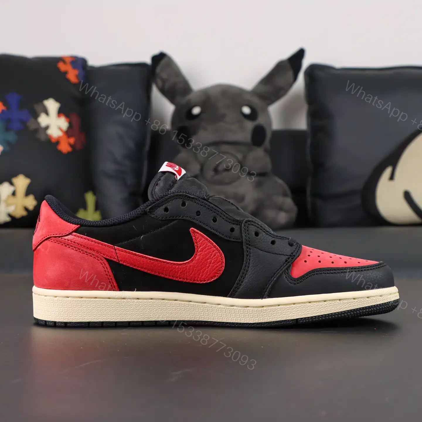 View 2 of Travis Scott x Jordan Air Jordan 1 Bred Reps
