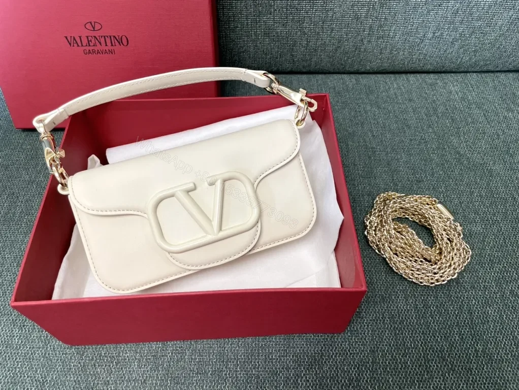 View 4 of Bold Red Leather Bag with Signature V Buckle - Luxury Crossbody