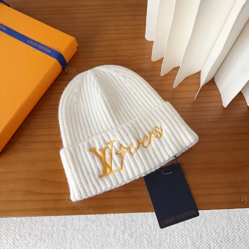 View 3 of Cozy Knit Beanie with Subtle Gold Monogram Embroidery
