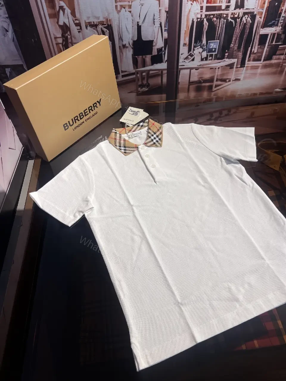View 7 of White Piqué Polo with Signature Check Collar - Contemporary Luxury