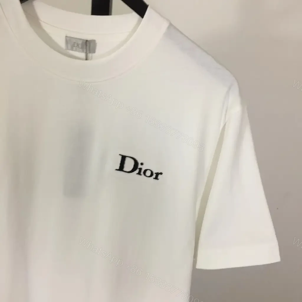 View 6 of Minimalist White Tee: Premium Cotton, Subtle Logo, Classic Fit tee