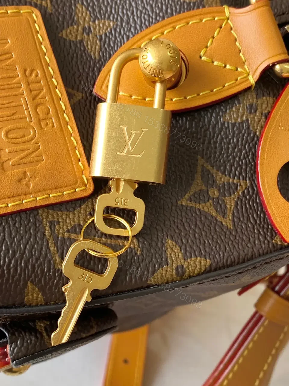 View 9 of Dark Brown LV Monogram Mini Luggage Bag on Wheels