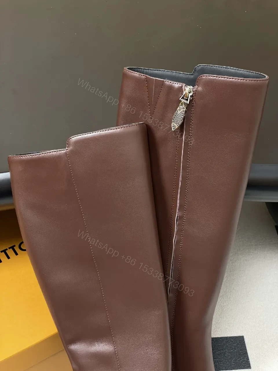 View 5 of Brown Leather Knee-High Boots with LV-Accent Details