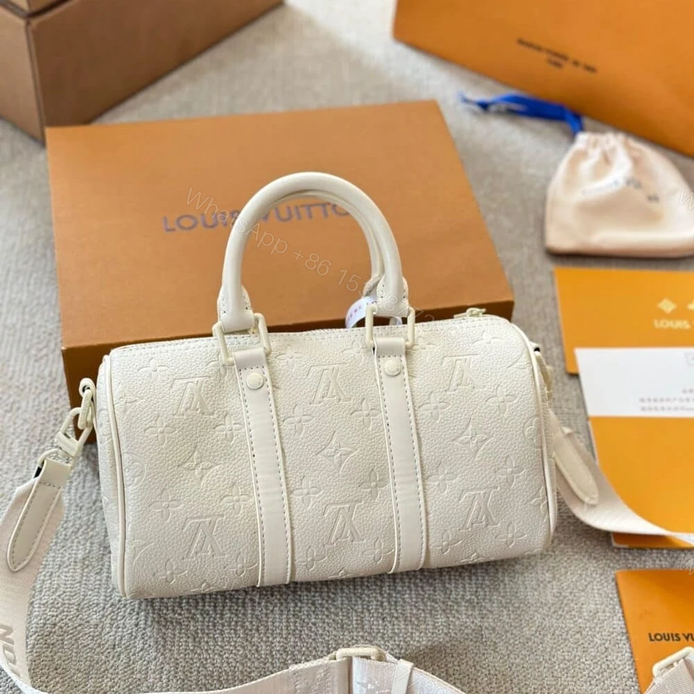 View 3 of Louis Vuitton Keepall Bandoulière Full Moon 25Cm M24434