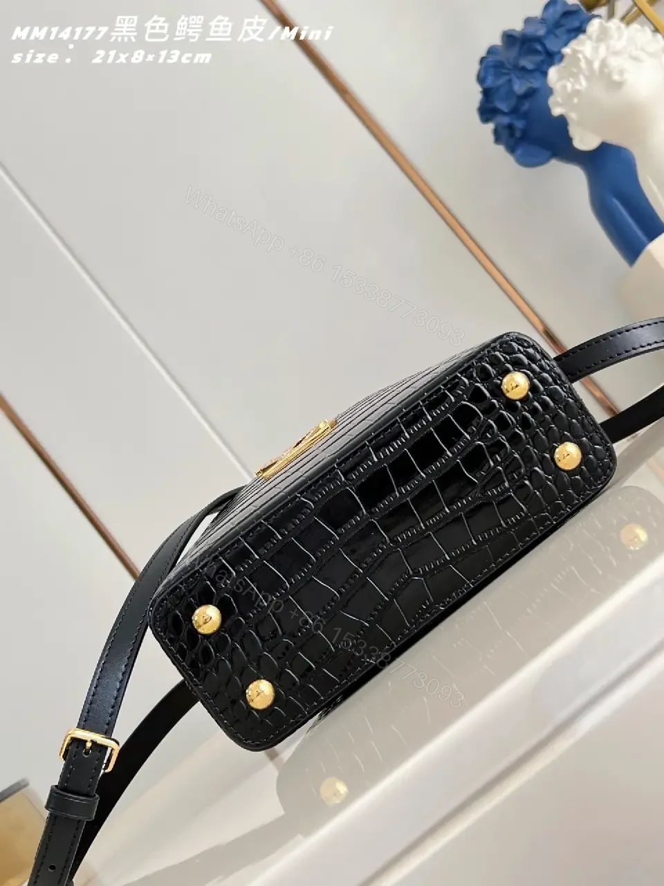 View 4 of Crocodile-Texture Mini Bag with Gold Emblem – Luxe Everyday Glam