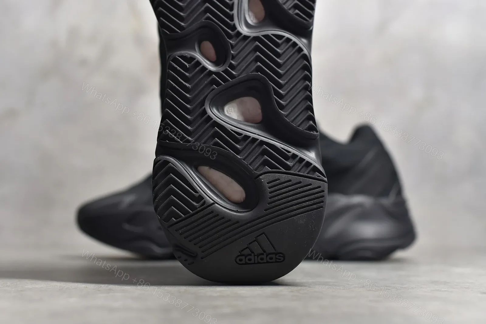 View 9 of Adidas Yeezy Boost 700 MNVN “Triple Black” Reps