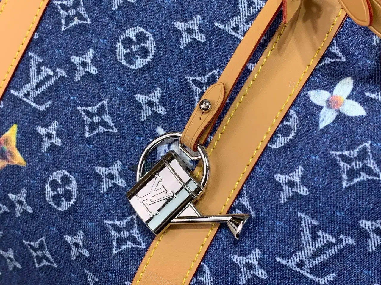 View 9 of Blue denim monogram-print travel bag with tan leather trim for luxury weekends