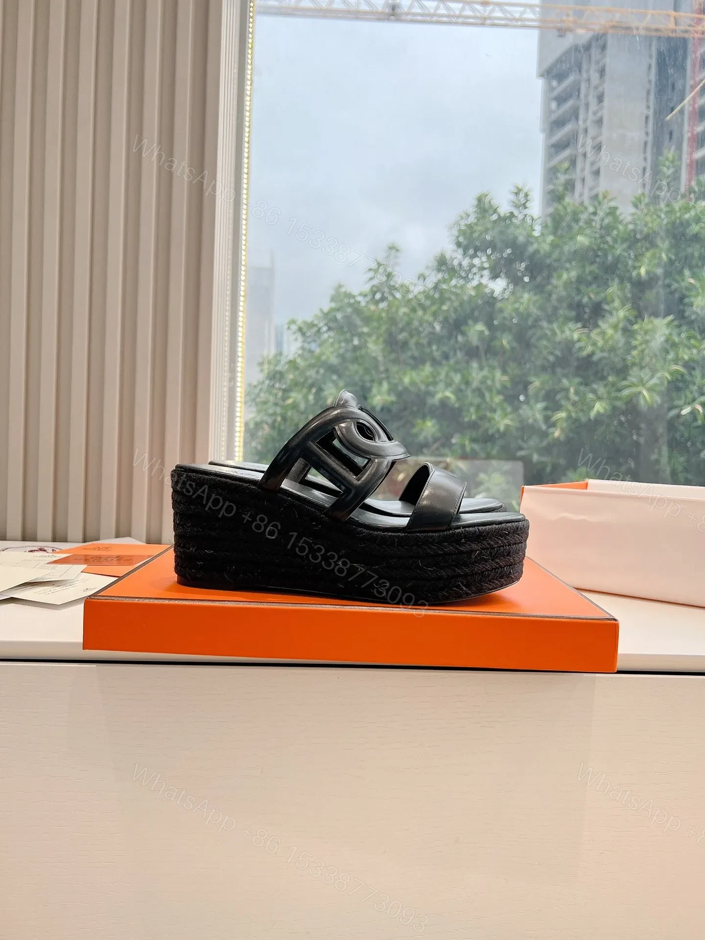View 2 of Hermes Women Black Leather Slip-On Sandals