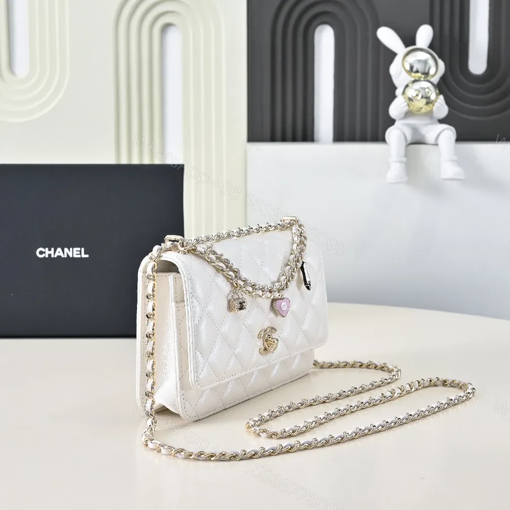View 2 of Quilted Mini Bag: White Calfskin, Gold Chain, Luxe Silhouette