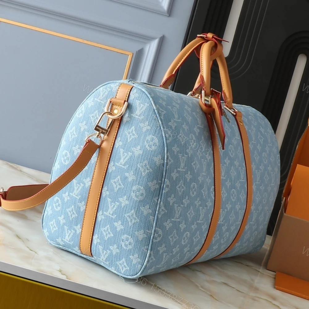 View 3 of Louis Vuitton Keepall Bandoulièrè 45 Bag Sky Blue Denim 45Cm M25334