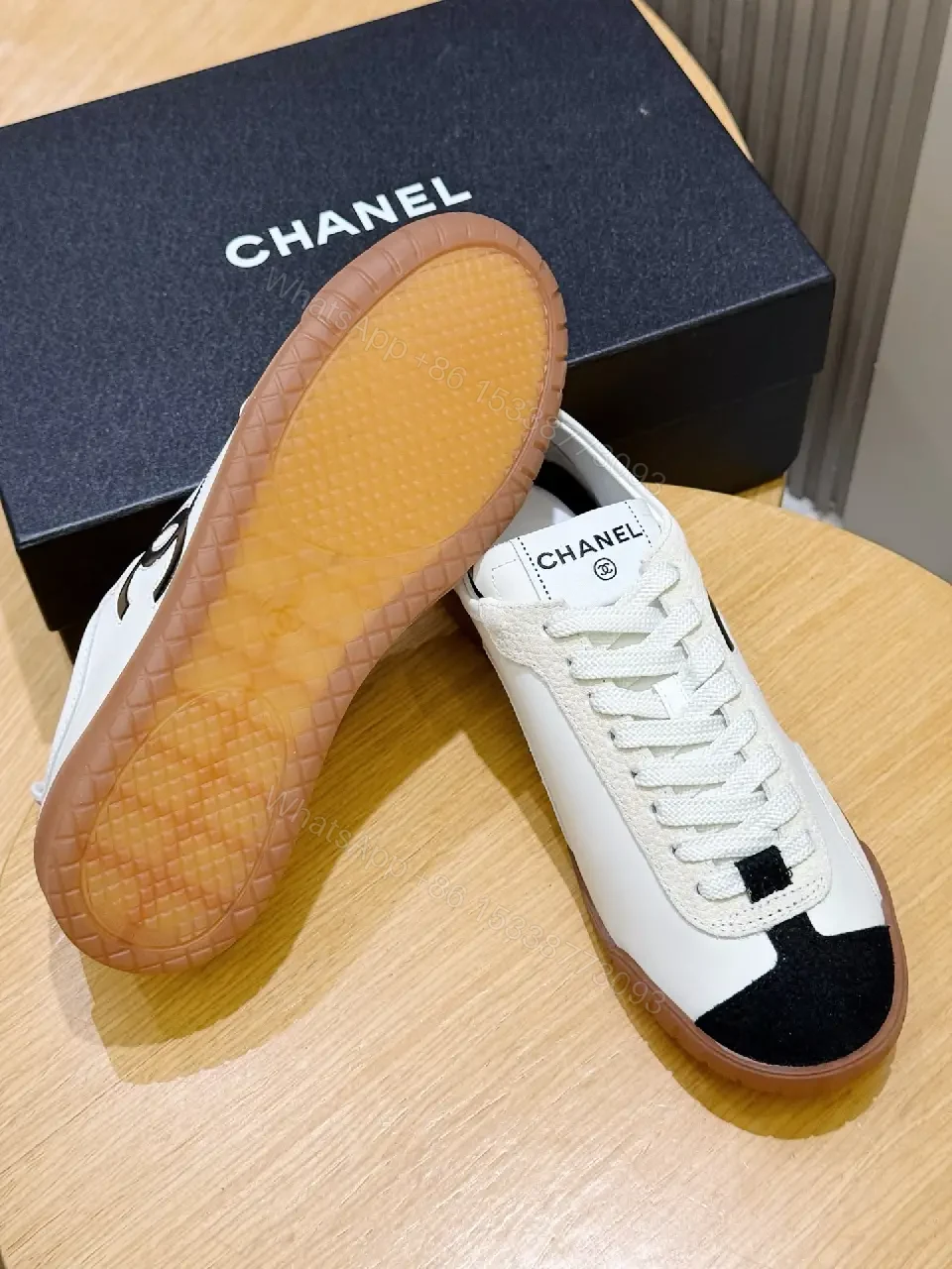 View 4 of White Leather Sneaker Black Toe Classic Chanel Logo Shoes